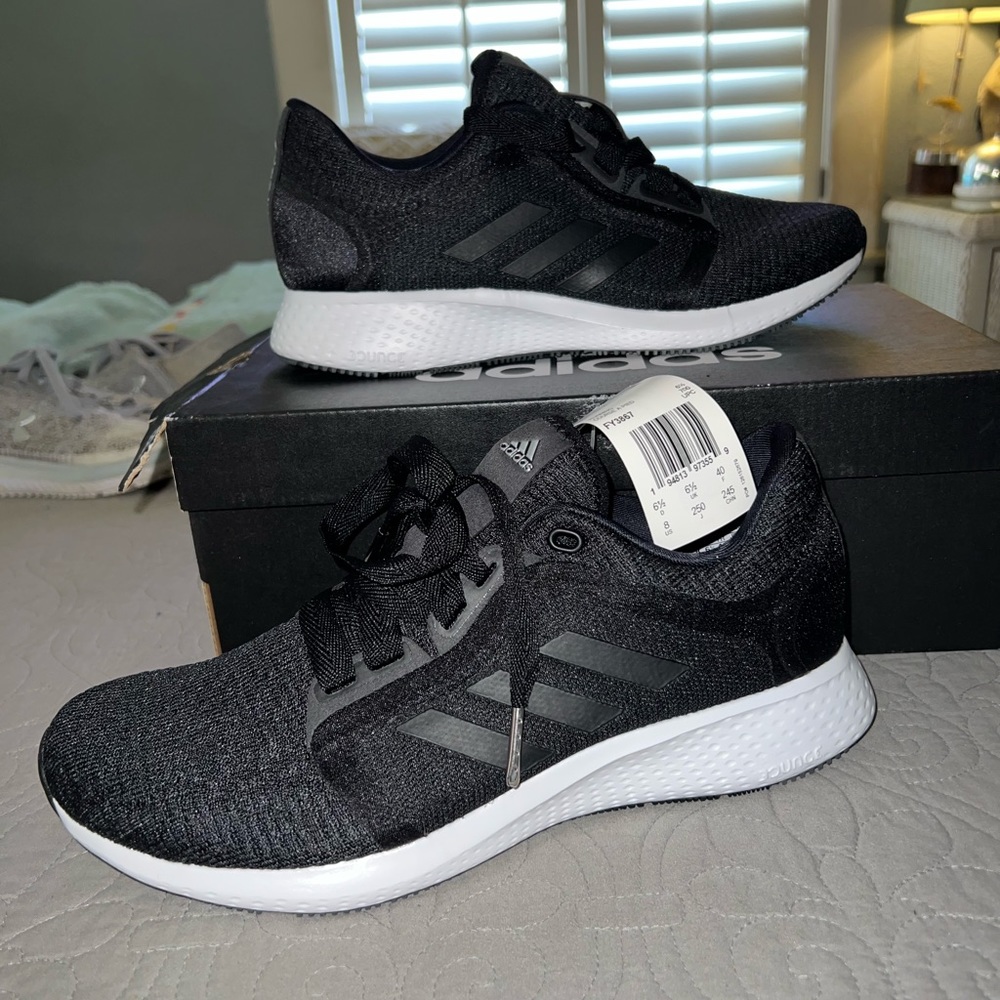 Black and white adidas size 8